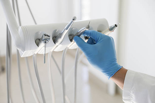 Professional Tooth Extraction technician working in Quincy, IL